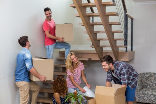 Professional removalists handling household items in Nottinghill Storage