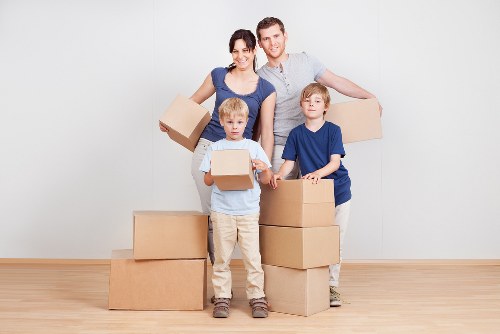 Professional packers organizing items in Nottinghill Storage